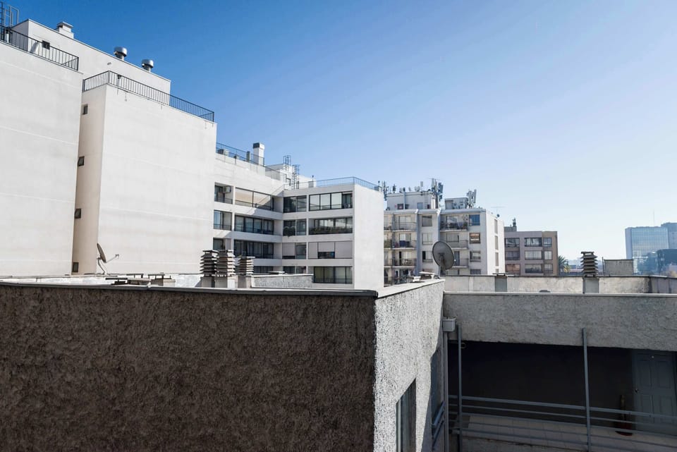 Enjoy the urban skyline views from your cozy studio apartment in the heart of Chile.