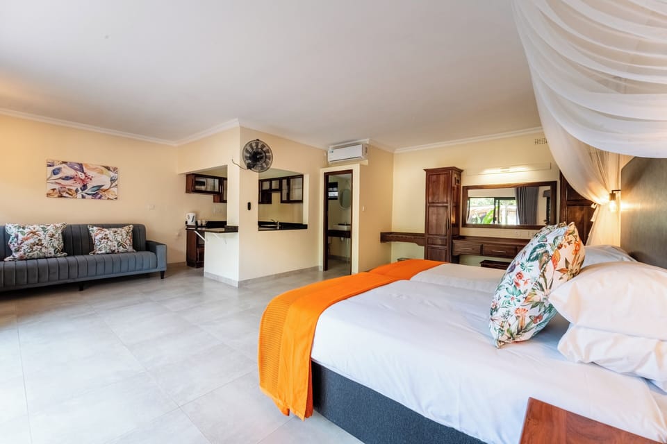 Deluxe Double or Twin Room, Garden View | In-room safe, desk, laptop workspace, blackout drapes
