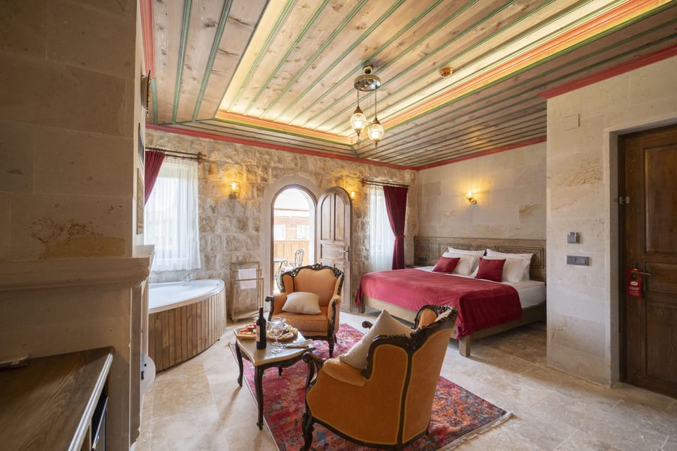 Deluxe Suite, Balcony, City View | In-room safe, blackout drapes, soundproofing, free WiFi