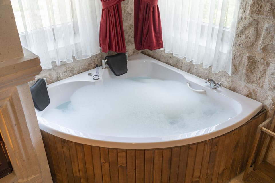 Deluxe Suite, Balcony, City View | In-room safe, blackout drapes, soundproofing, free WiFi