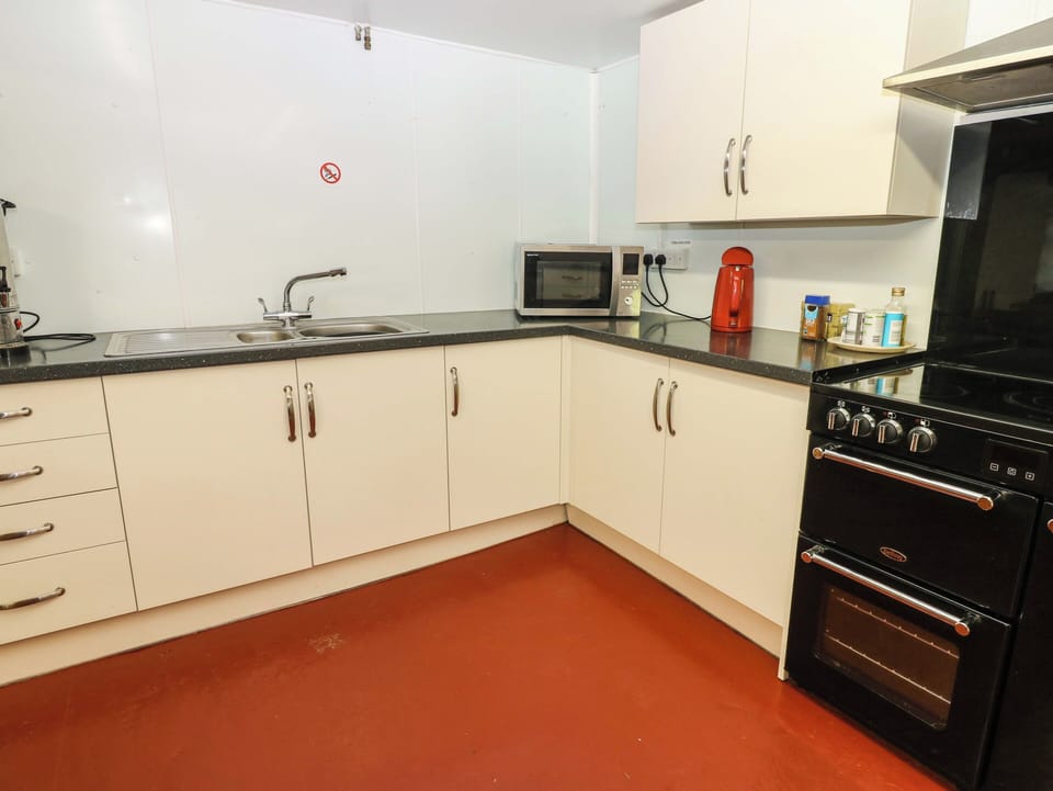 Fridge, microwave, toaster, cookware/dishes/utensils