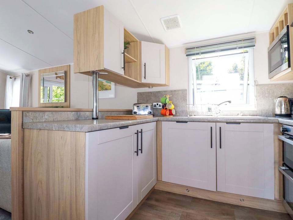 Fridge, microwave, toaster, cookware/dishes/utensils