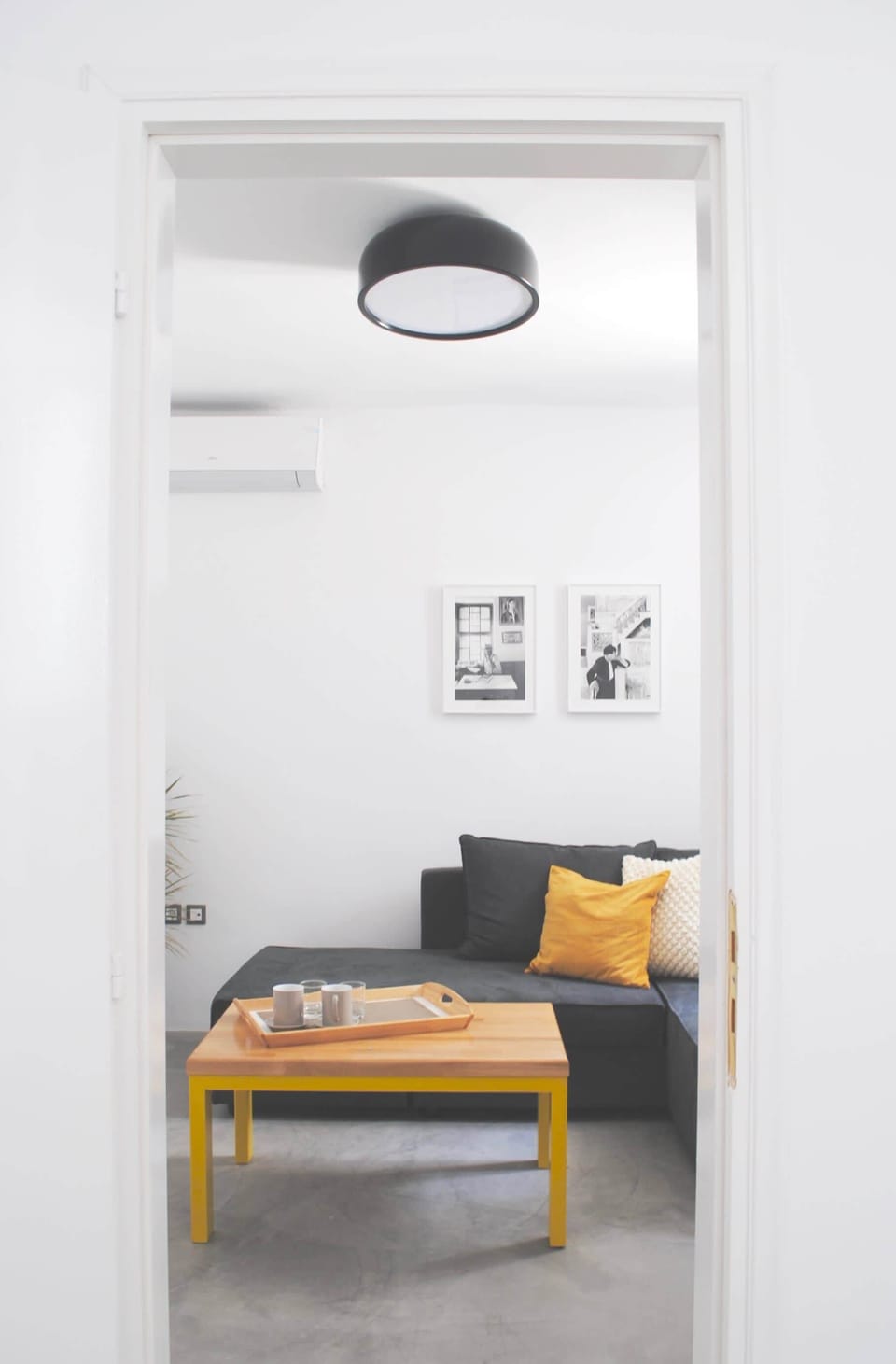 Cozy Lounge Area with Coffee Table and Wall Art


