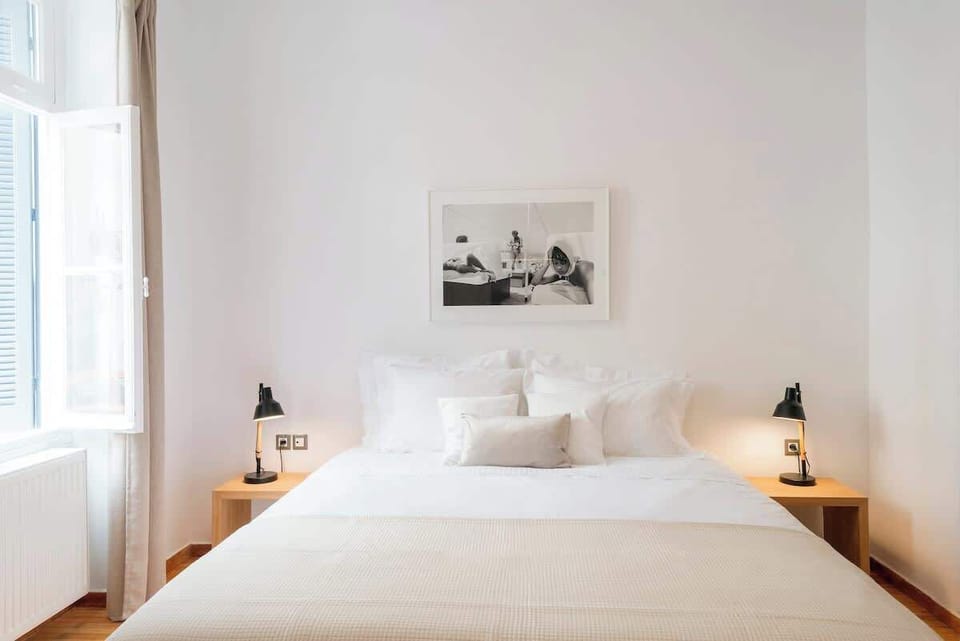 Double Bedroom – View 5 – Clean design with accent cushions and lamps.

