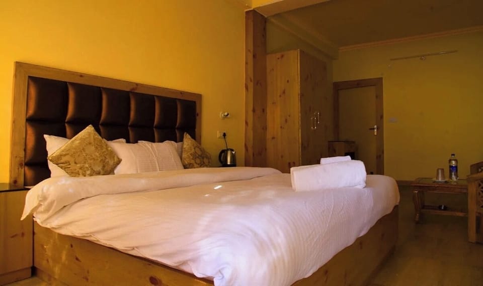 Deluxe Double Room, Hill View | Bathroom | Shower, slippers, towels, soap