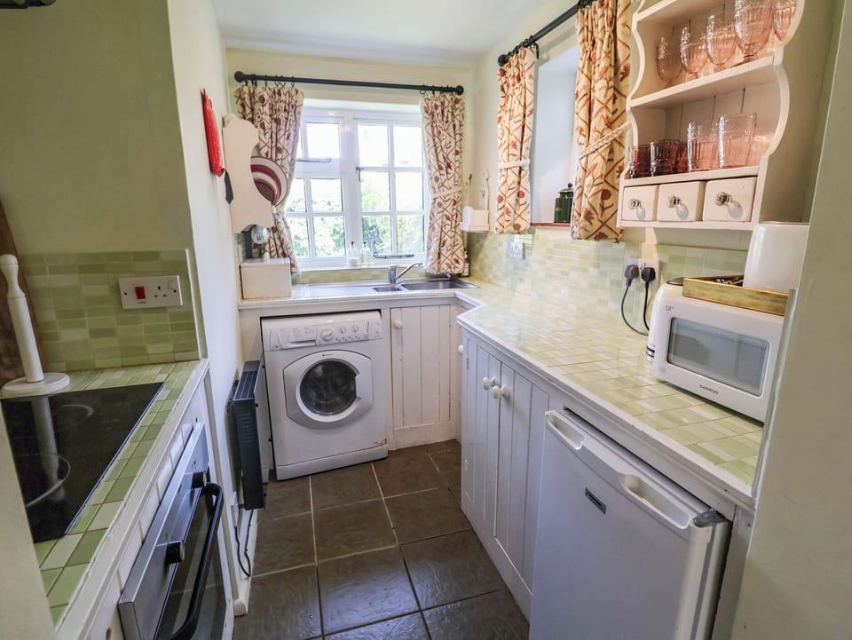 Fridge, microwave, toaster, cookware/dishes/utensils