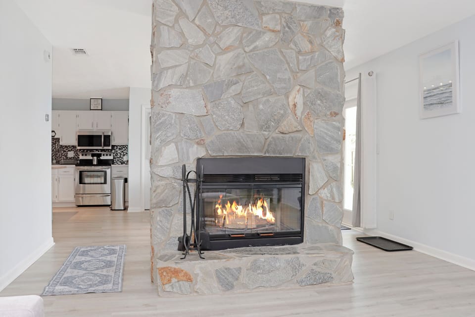 Fireplace Separating Living and Dining Rooms