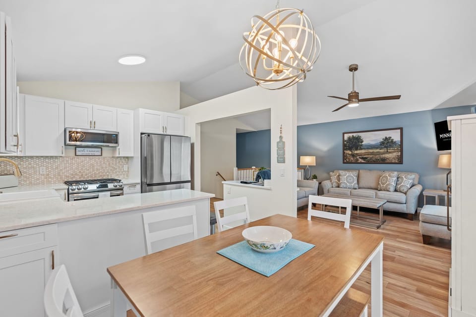 Unwind in your bright open-plan space where the modern kitchen flows seamlessly into your cozy living area, perfect for gathering.