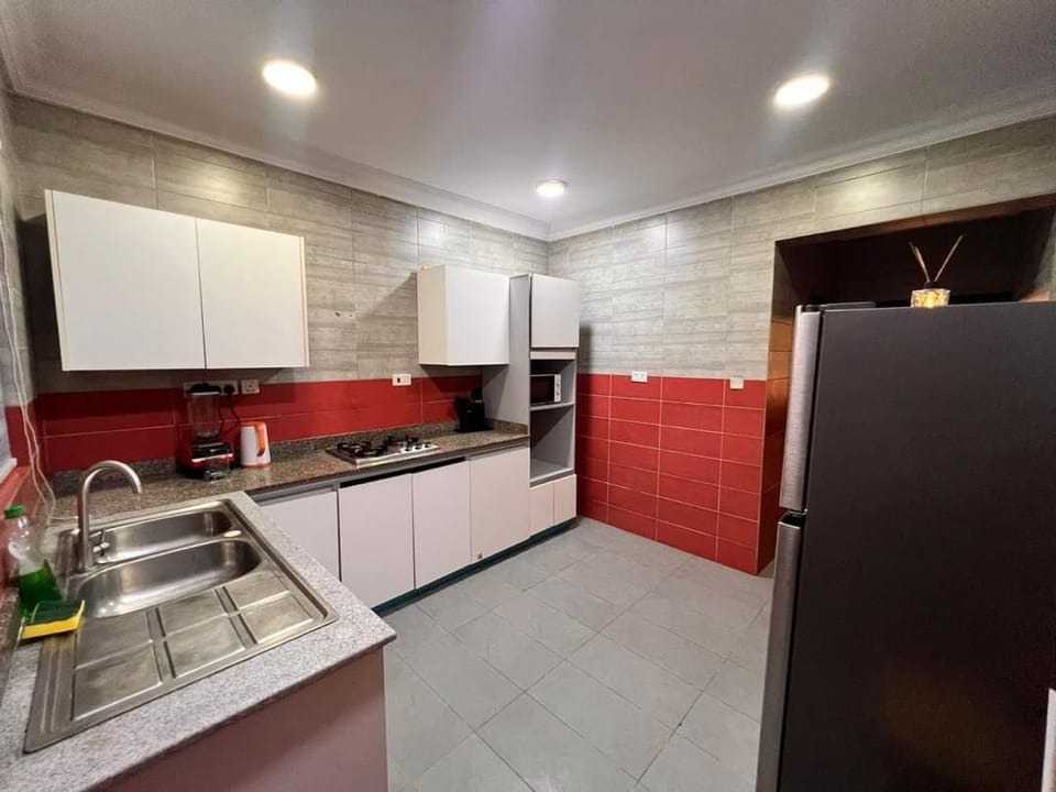 Luxury Apartment | Private kitchen | Fridge, microwave, cookware/dishes/utensils