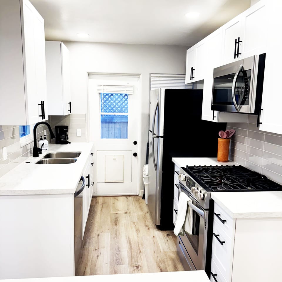 Galley Style Kitchen, shaker style new cabinets, New stainless steel appliances