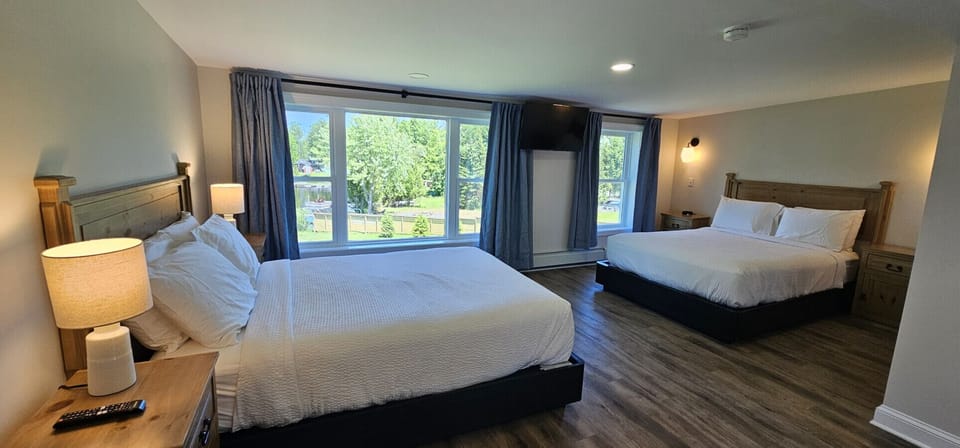 Spacious room with two plush queen beds—perfect for families or friends