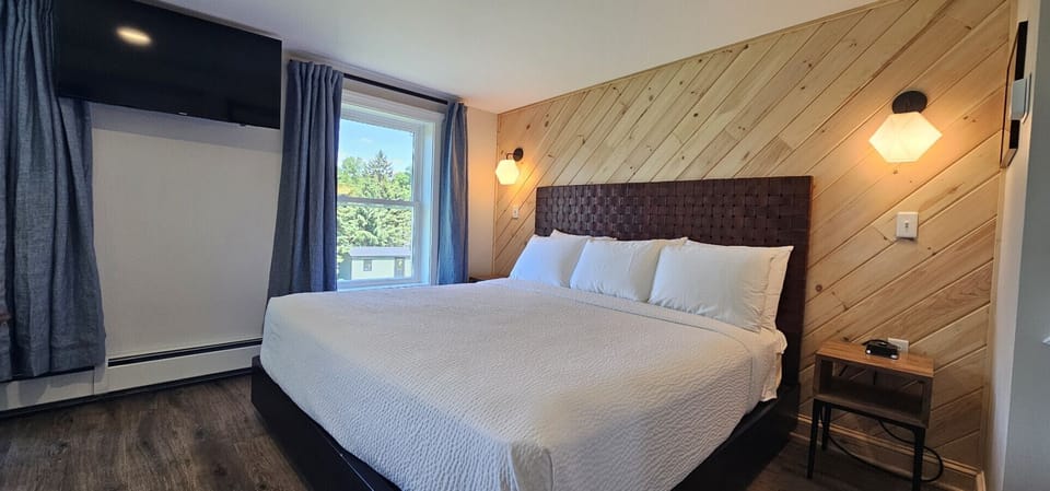 Rest easy in a plush king bed with crisp, hotel-quality linens and lake breezes.