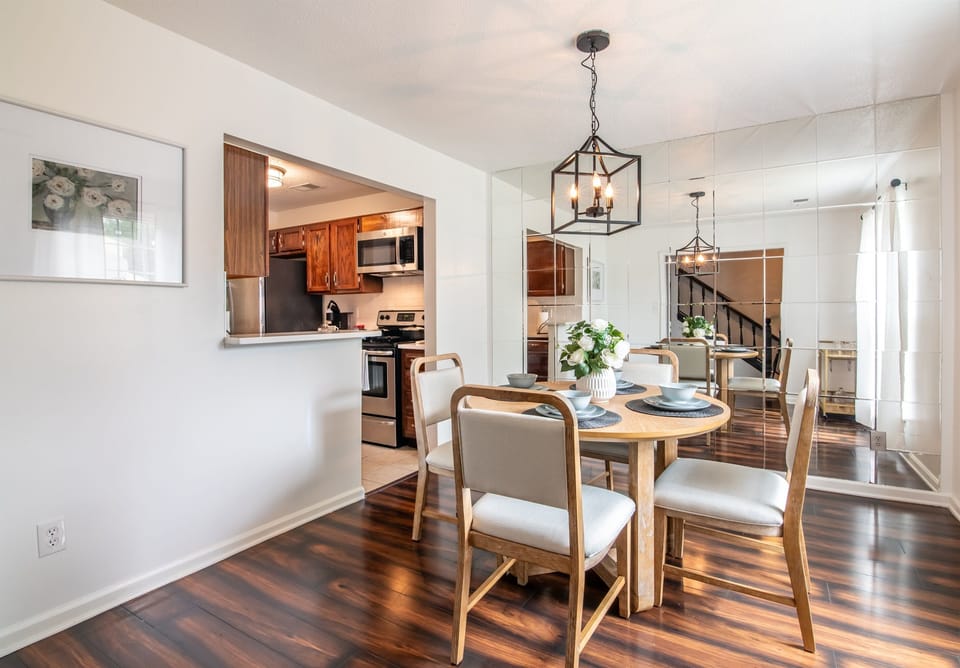 Dining area with open flow into the kitchen — great for meals or working remotely.