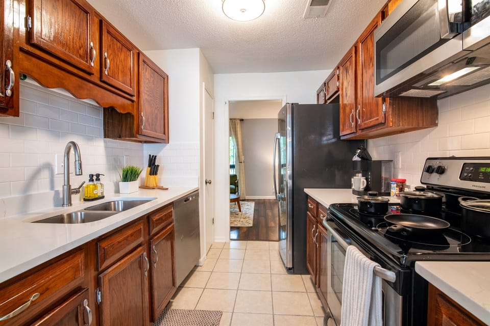 Fully equipped kitchen with modern appliances and plenty of counter space.