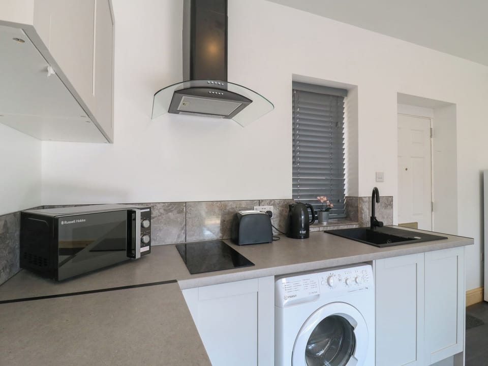 Fridge, microwave, toaster, cookware/dishes/utensils