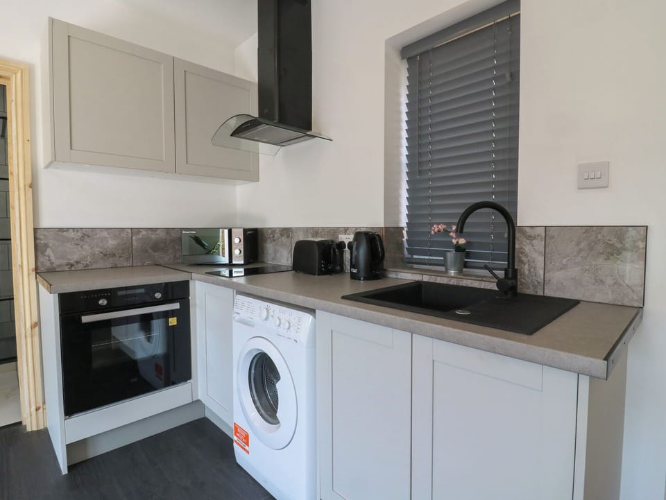 Fridge, microwave, toaster, cookware/dishes/utensils