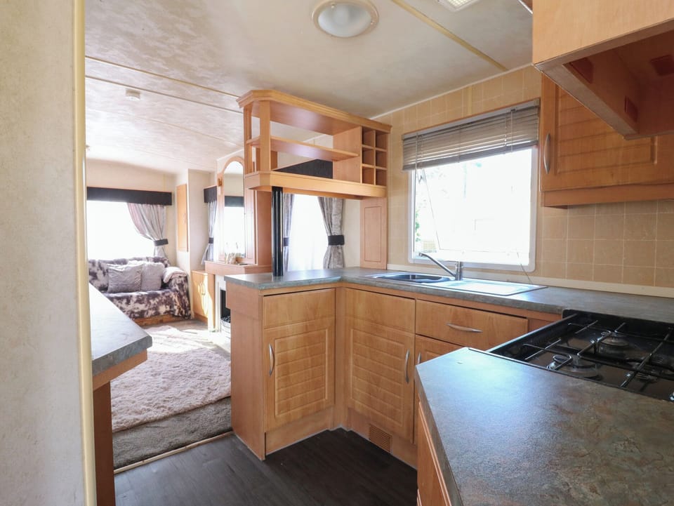 Fridge, toaster, cookware/dishes/utensils