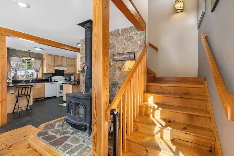 Stairs leading up to the 4 bedrooms and 2nd bathroom.Gate provided at the top and bottom of the stairs for child/pet safety.