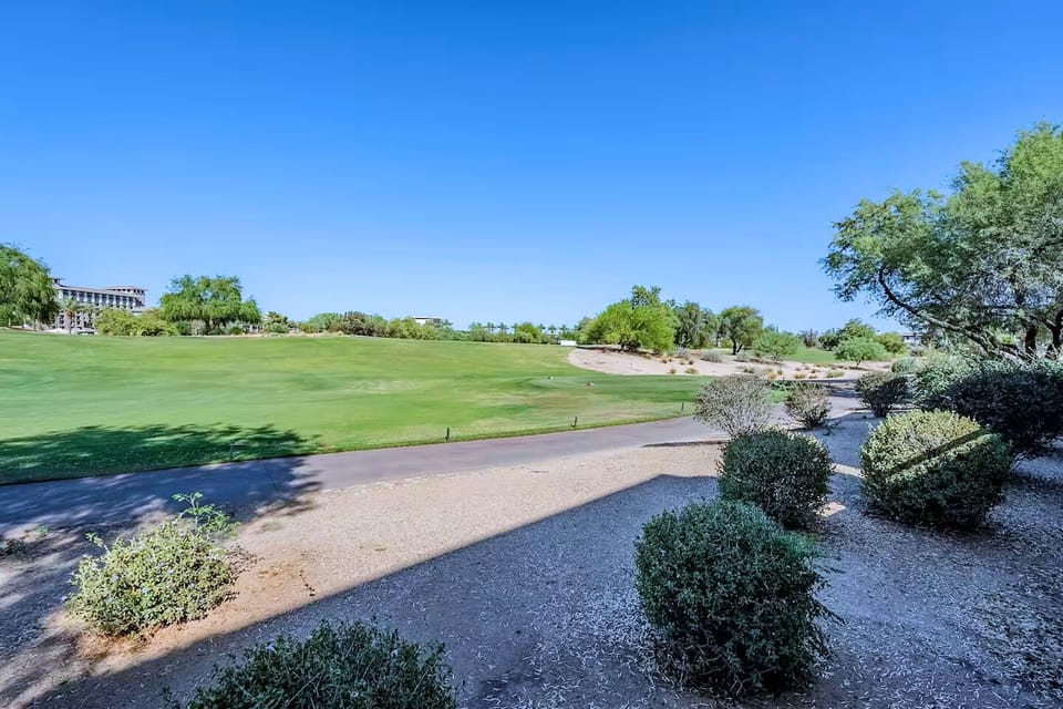 Take a walk along the golf course in this beautiful neighborhood.
