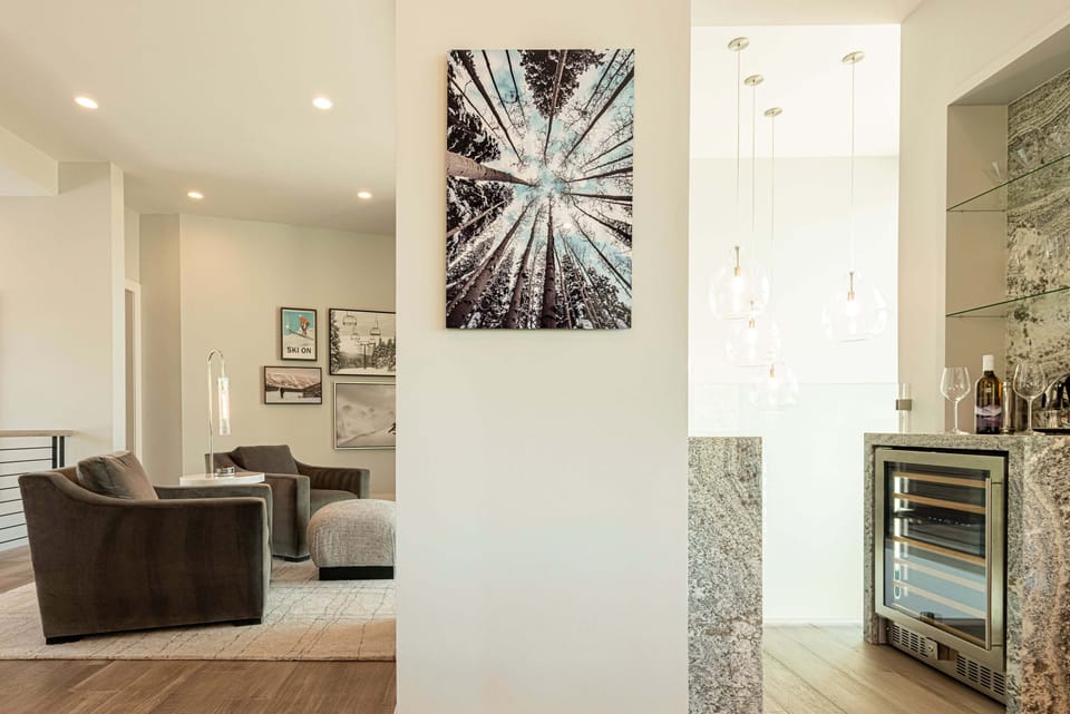 Wine and cocktail area - Two dual-zone wine fridges encased in granite