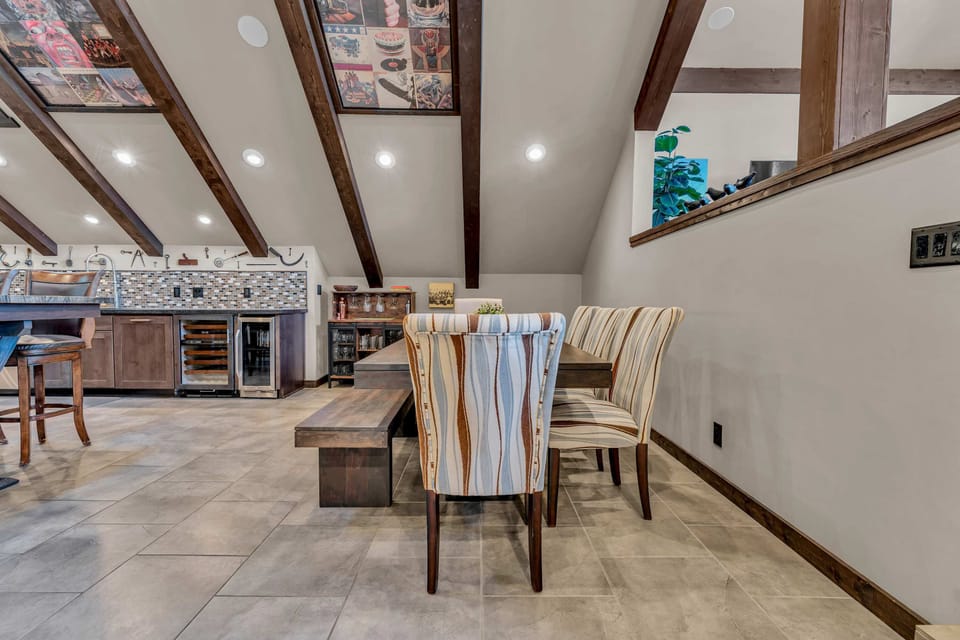 Dining area: Second floor. The dining table seats 8, and the bar height table in the kitchen seats 6.