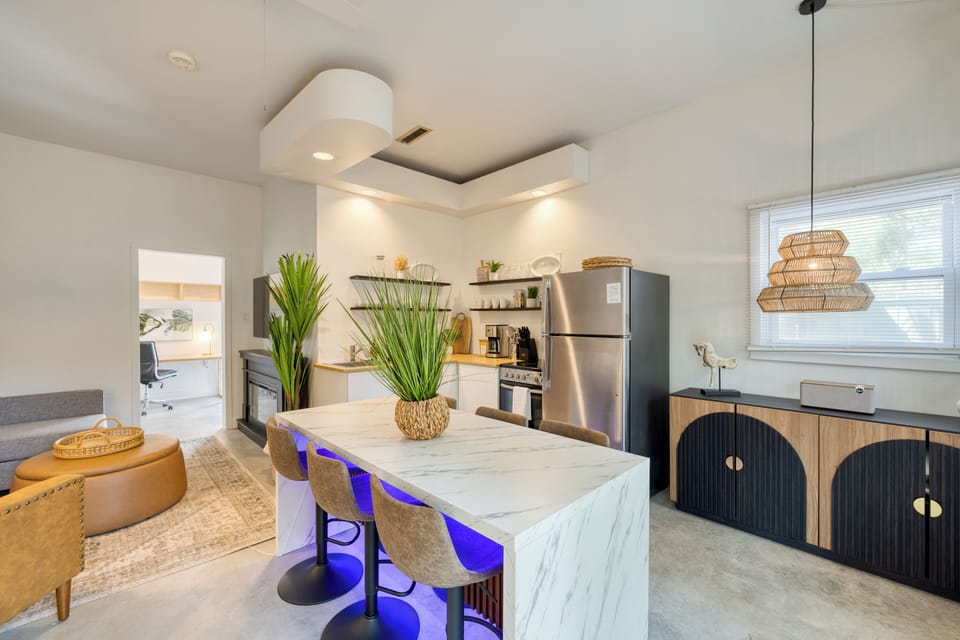 Upgrade your dining experience with a center island table and barstool seating.