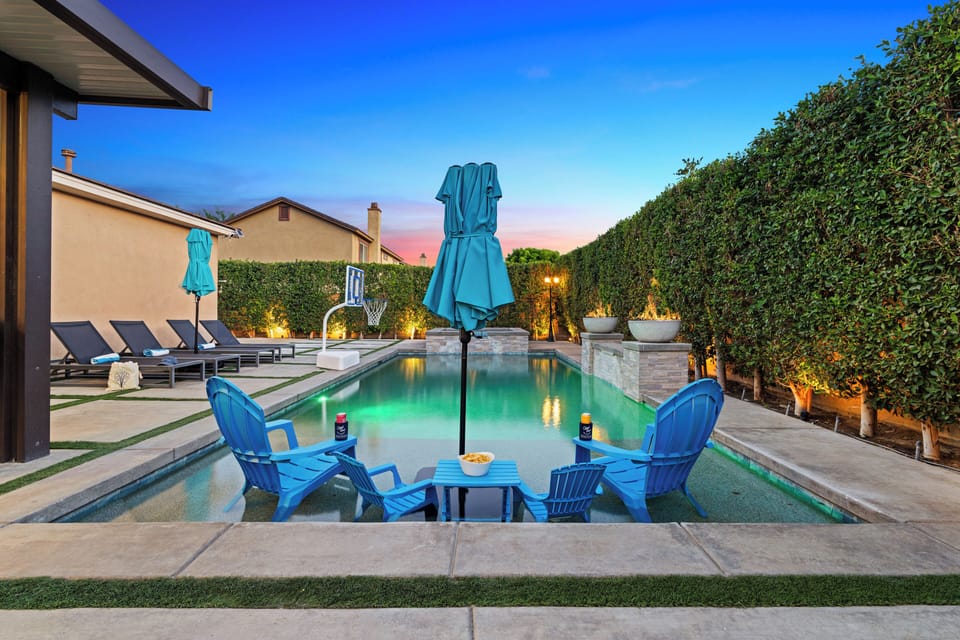 A luxurious outdoor pool and spa area.