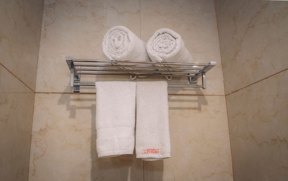 Double Room | Bathroom | Shower, slippers, towels, soap