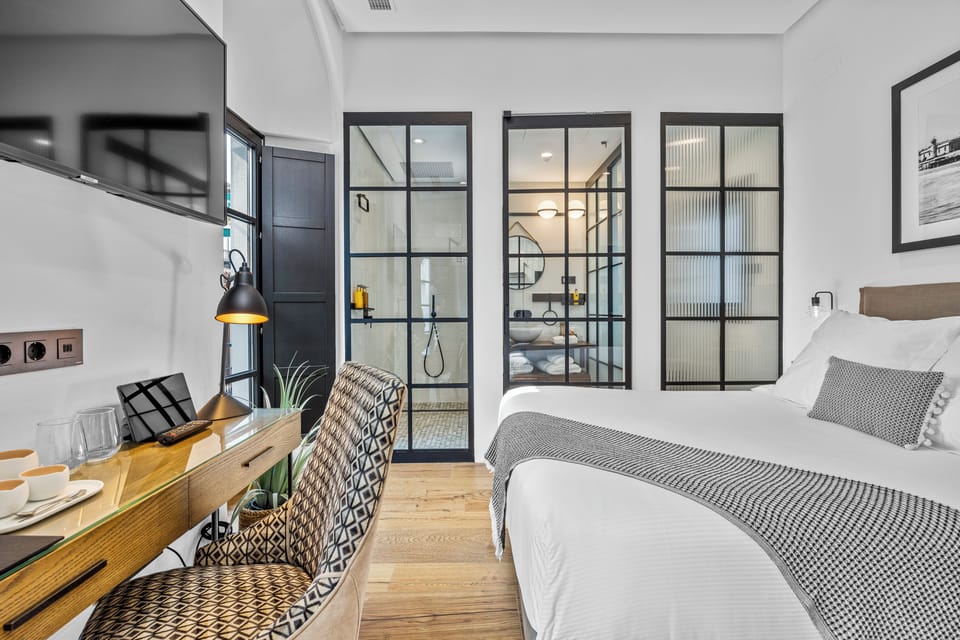 Deluxe Double Room | In-room safe, desk, laptop workspace, blackout drapes