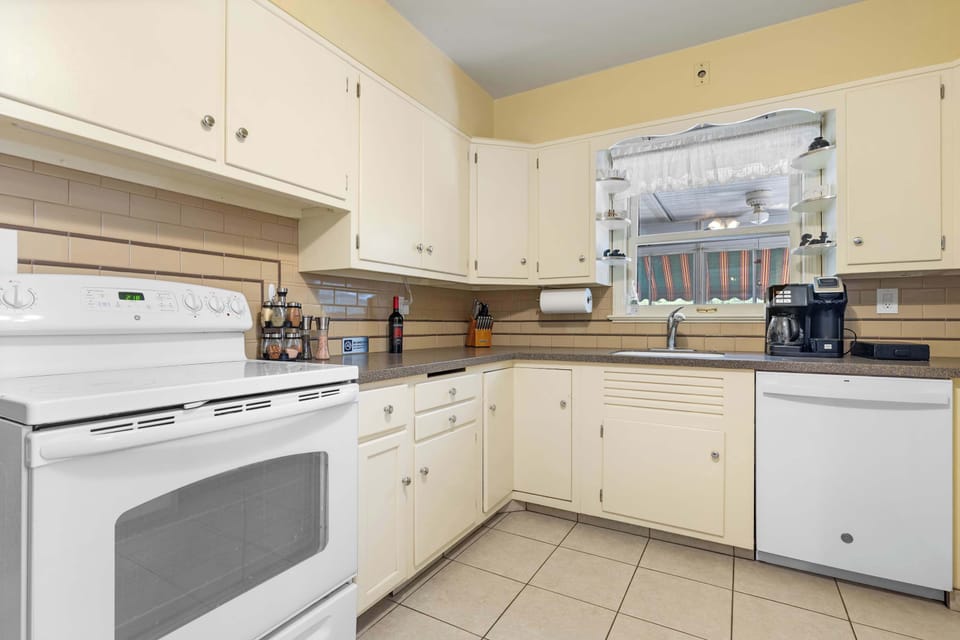 Our spacious kitchen is great for cooking at home while you stay! We have pots, pans, and baking sheets all here for you!