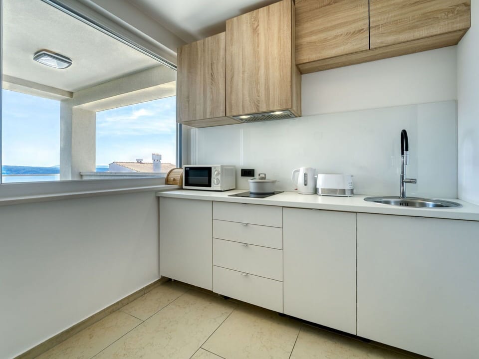 Kitchen, Countertop, Interior Design, Flooring, Kitchen Sink, Cabinetry, Kitchen Appliance, Sink, Floor, Ceiling