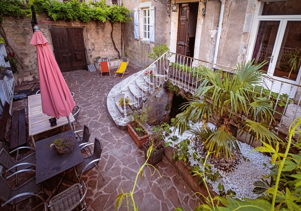 Courtyard with garden furniture and barbecue