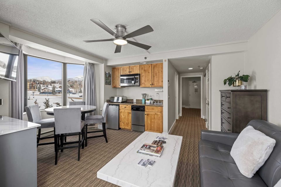Living area with pull out sofa and Kitchenette | Listed with @BookTraverse