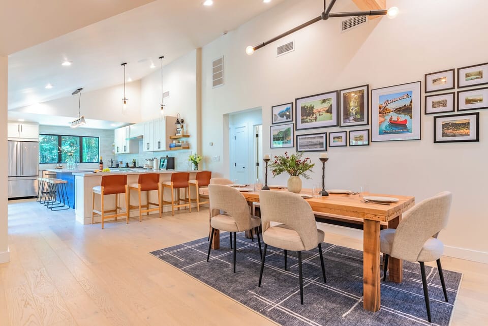 Dine at the kitchen island, the breakfast - bar or the dining room table.