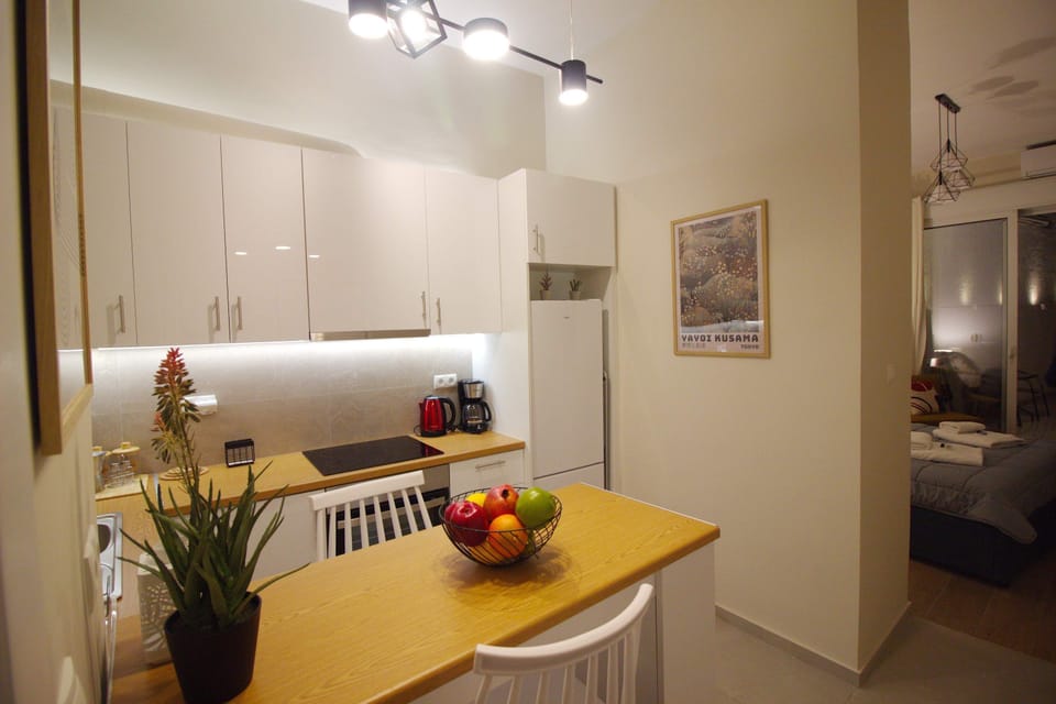 Fully-equipped kitchen area with dining space