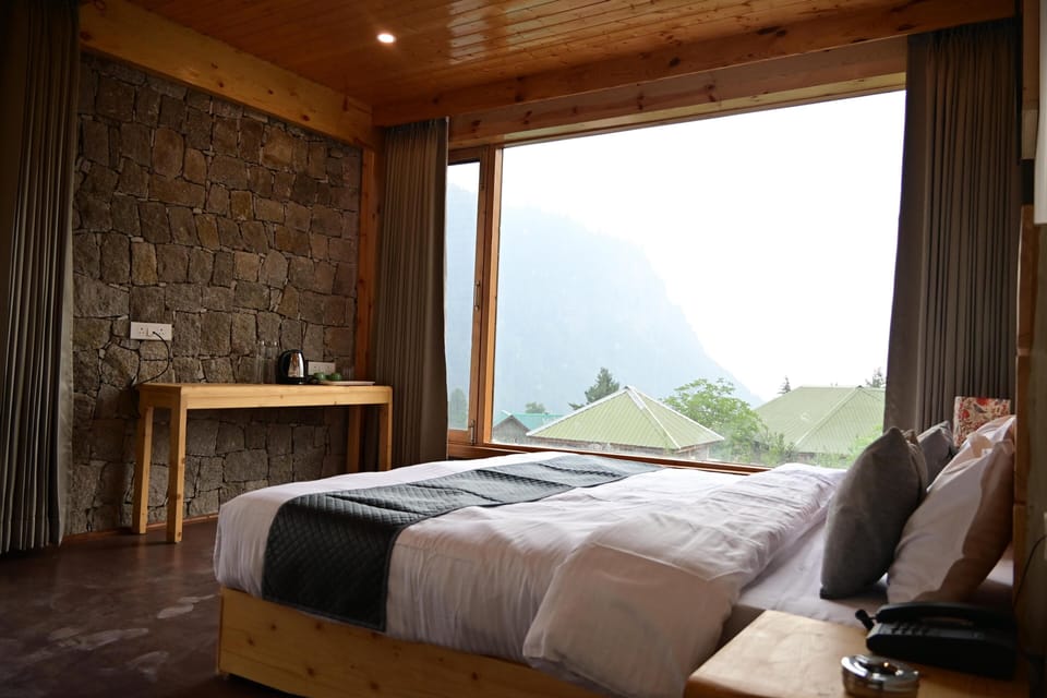 Premium bedding, down comforters, desk, laptop workspace