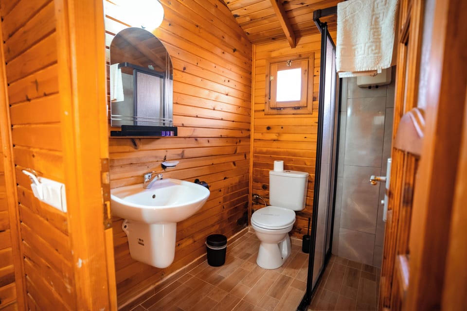 Standard Bungalow, Multiple Beds, Garden View | Bathroom | Shower, hair dryer, towels, soap