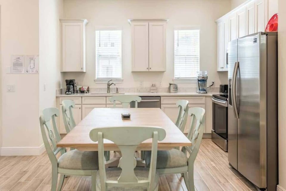 Kitchen is equipped with a dishwasher, microwave, fridge, stove, oven, toaster and coffee maker