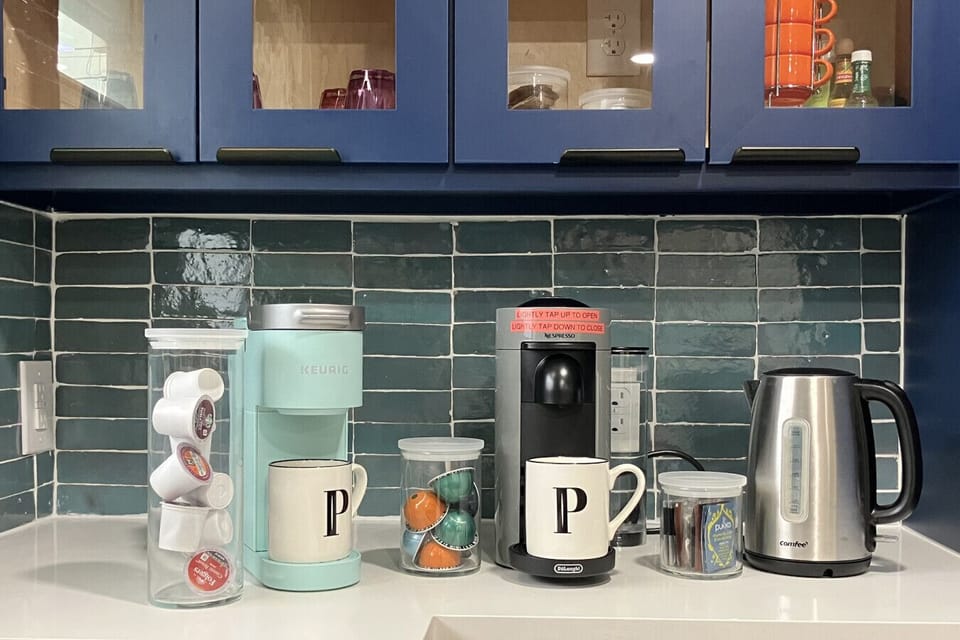 {Kitchen} Selection of coffees & teas, Keurig & Nespresso machines
