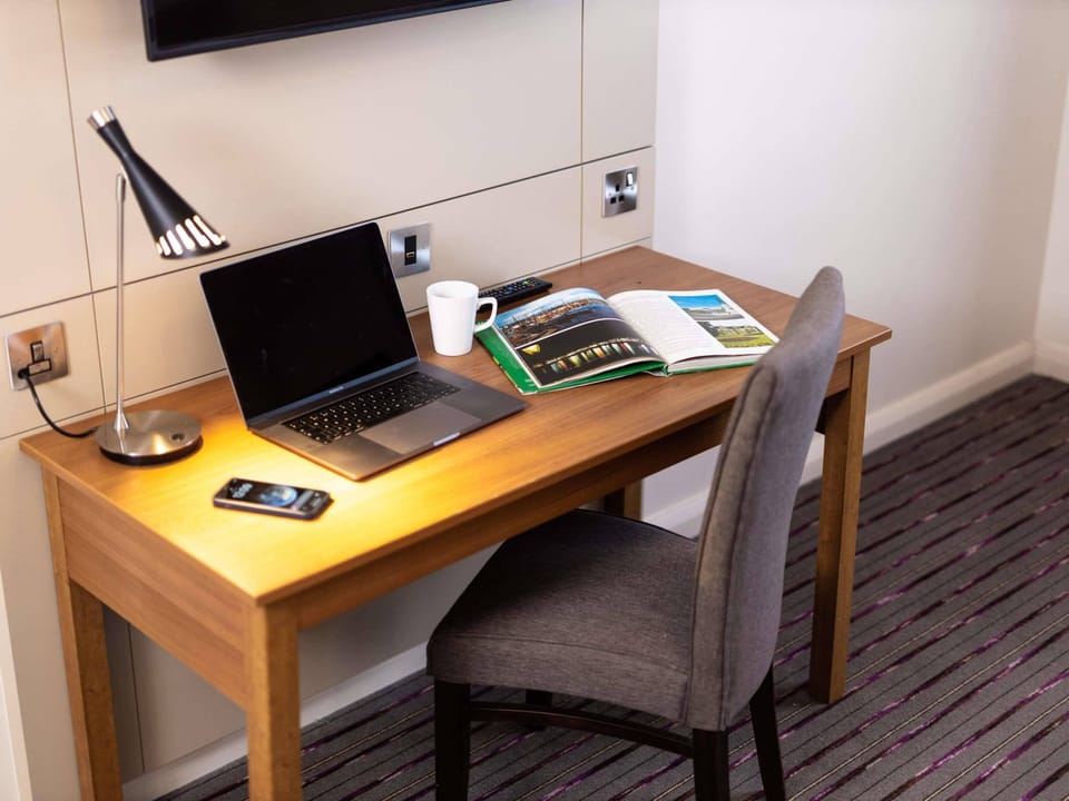 Desk, laptop workspace, free WiFi, bed sheets