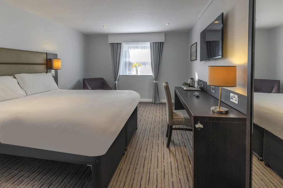 Blackout drapes, soundproofing, iron/ironing board, free WiFi