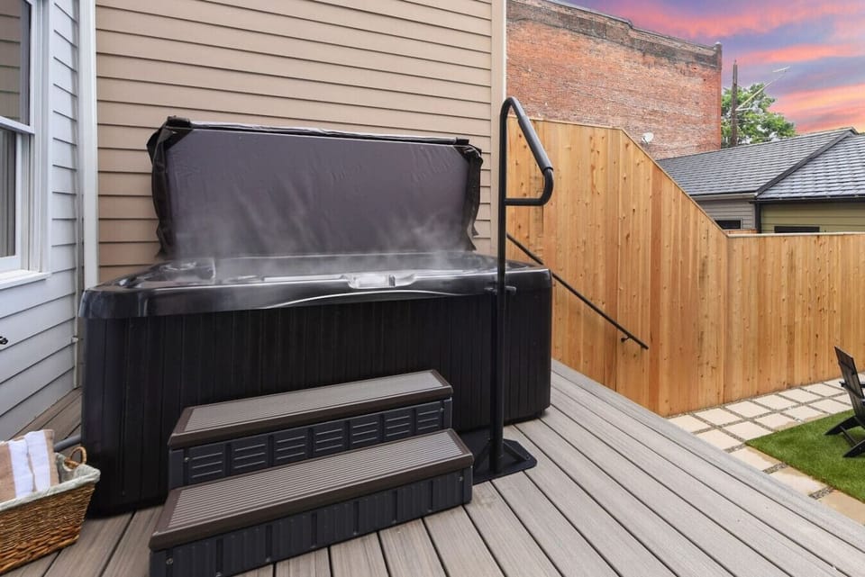 Relax and refresh in the private 6-person hot tub, perfect for any season.