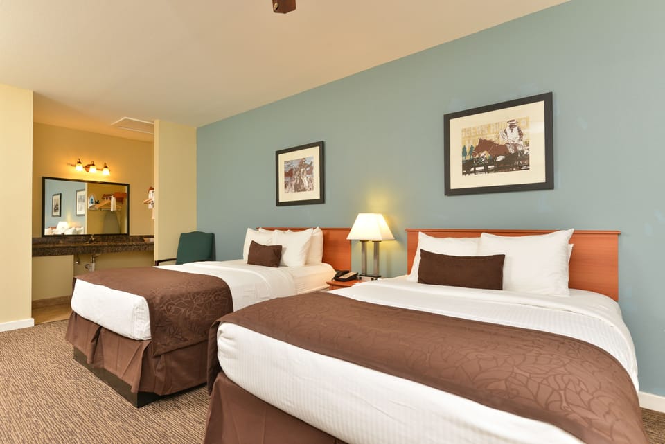 Standard Double Room, 2 Queen Beds | Desk, iron/ironing board, free cribs/infant beds, rollaway beds