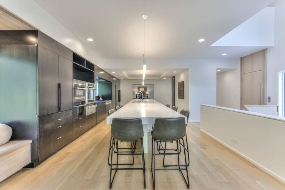 Luxury finishes throughout this home. The kitchen boasts a massive island counter and all the state of the art appliances.