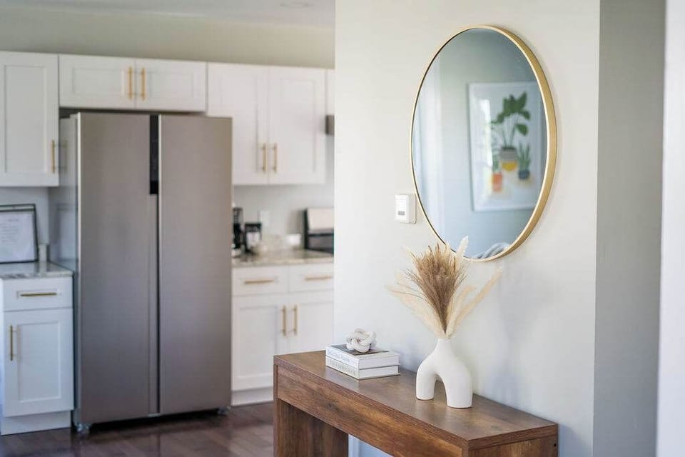 Entry- Step inside Jefferson & Grounds, where soft light and warm details create an instant sense of home.