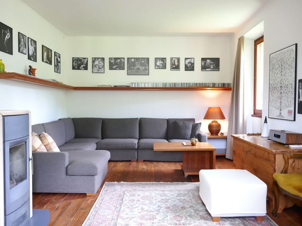 Furniture, Interior Design, Flooring, Couch, Floor, Wood, Living Room, Room, Table, Home
