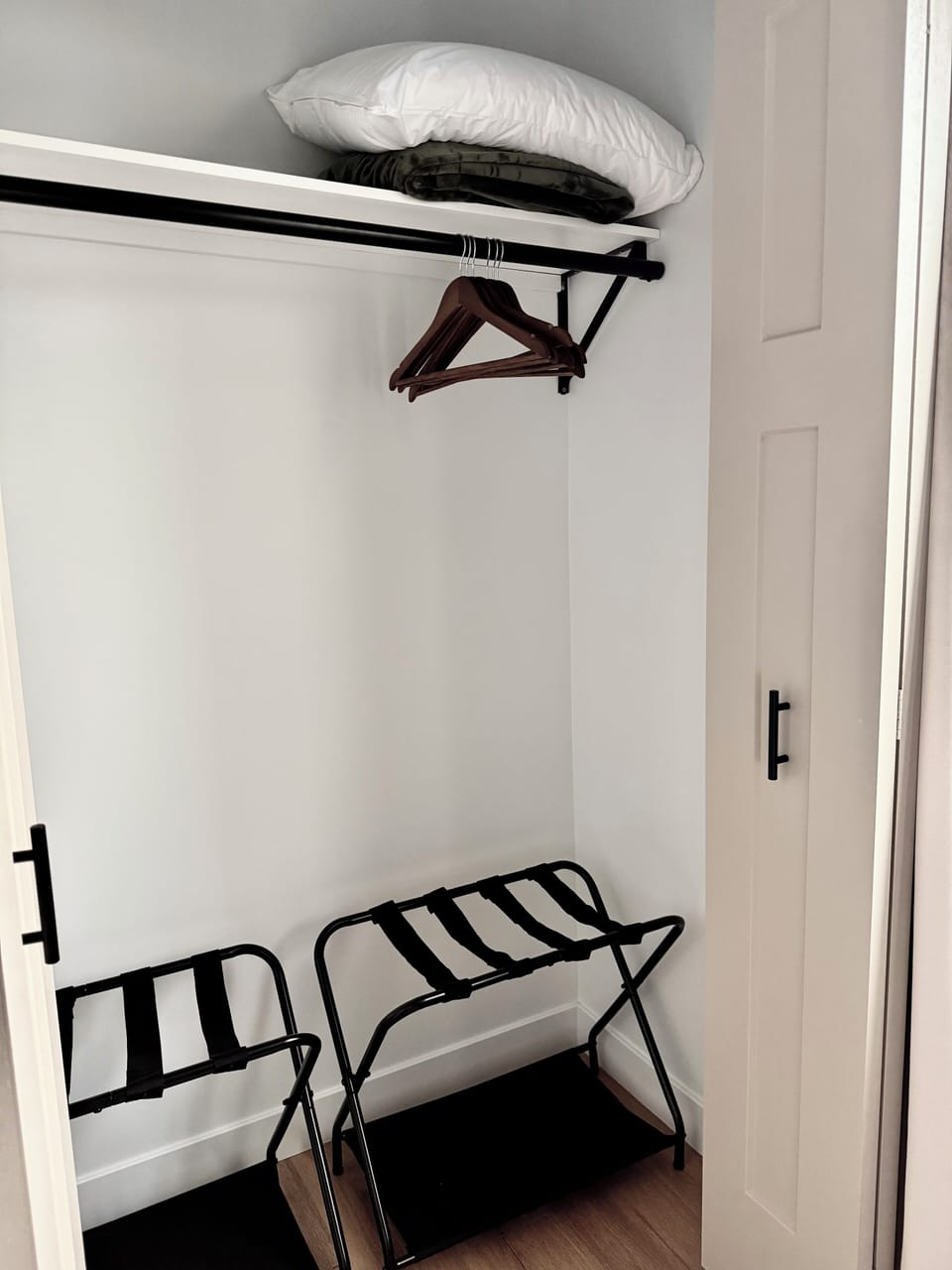 Extra Blanket/Pillow & Luggage Racks in Closets
