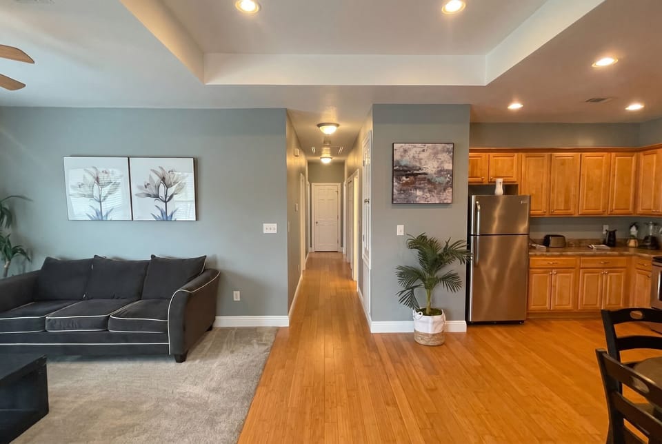 Bright open living area with full kitchen and spacious layout