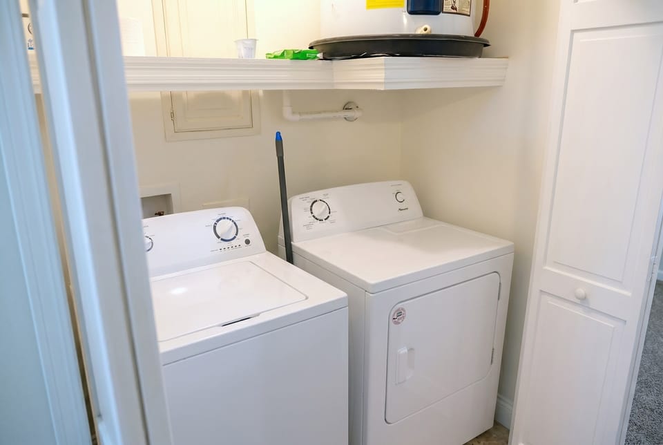 Convenient in-unit washer and dryer with handy storage shelf