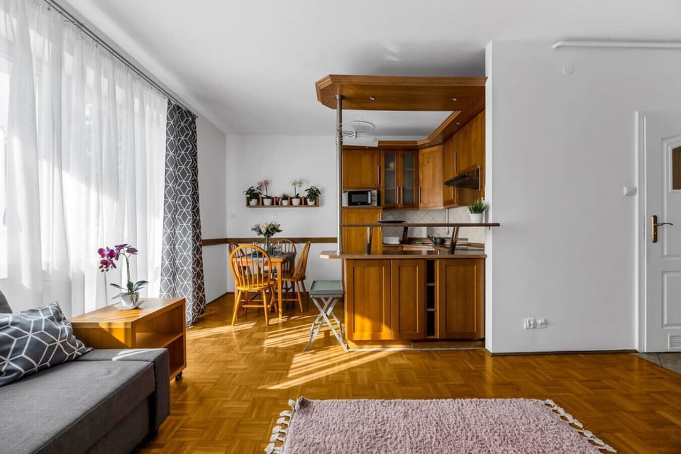 Living Area with Queen Bed, Sofa Bed and Smart TV | Book Now with RENTUJEMY.COM